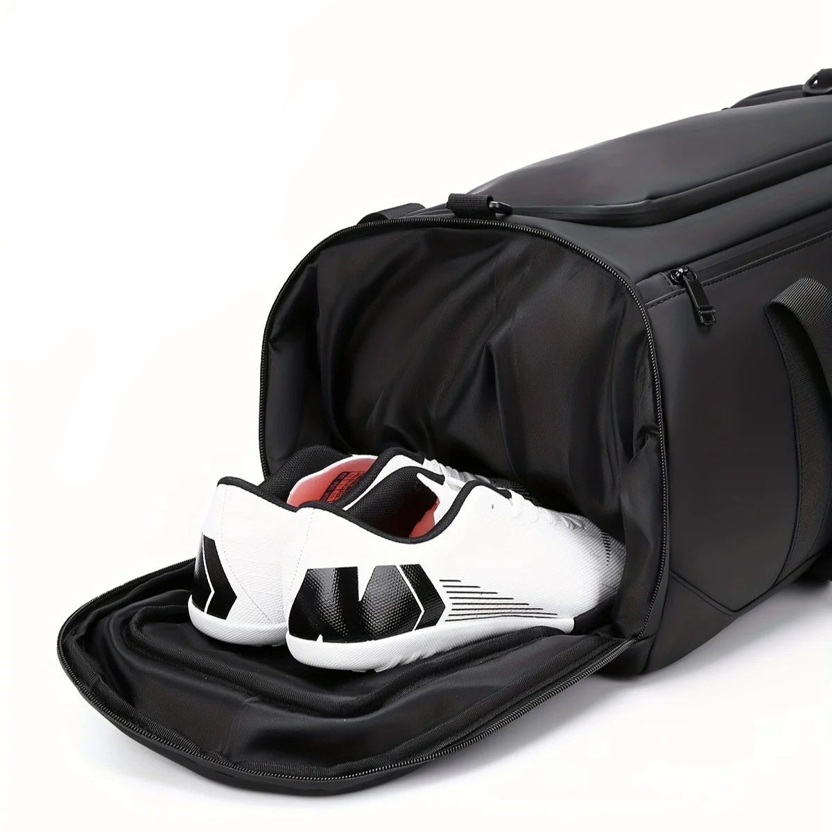 Black duffel bag with shoe compartment featuring a white sneaker, with text highlighting independent shoe storage.