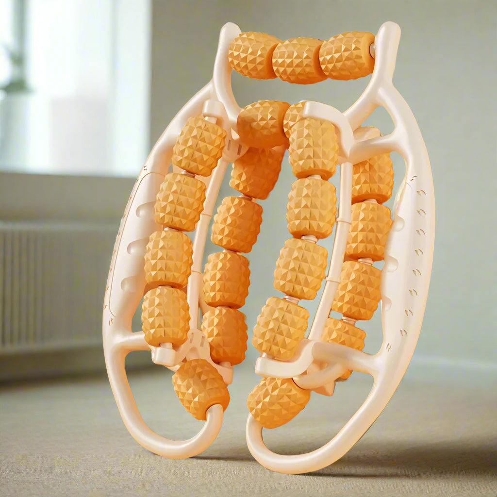 Massage roller with yellow nodes on a beige background