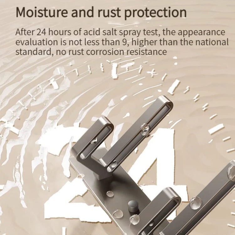 Metallic bracket with text about moisture and rust protection after an acid salt spray test.