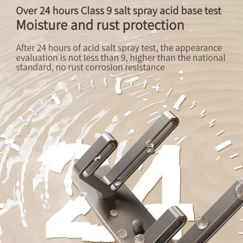 Metallic hanger object with text about salt spray acid base test and rust protection
