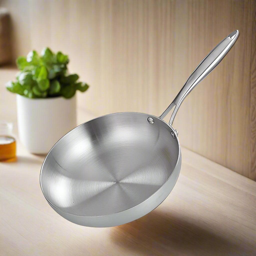 A 304 stainless steel frying pan with a long handle, displayed on a white background, indicating it is a non-stick skillet suitable for gas and induction cookers.