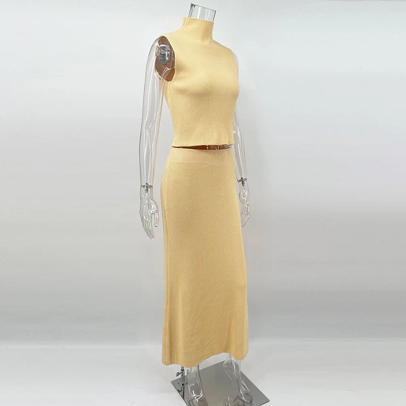 Elegant Knitted Two-Piece Set – Sleeveless Turtleneck Vest & High Waist Skirt