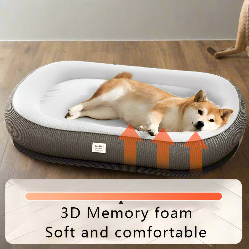 Dog lying on a gray pet bed with 3D memory foam label on a wooden floor.