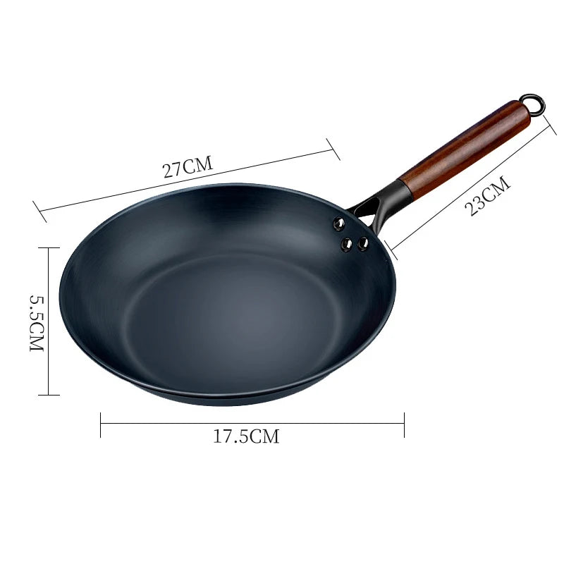 Black frying pan with wooden handle and dimensions labeled on a white background