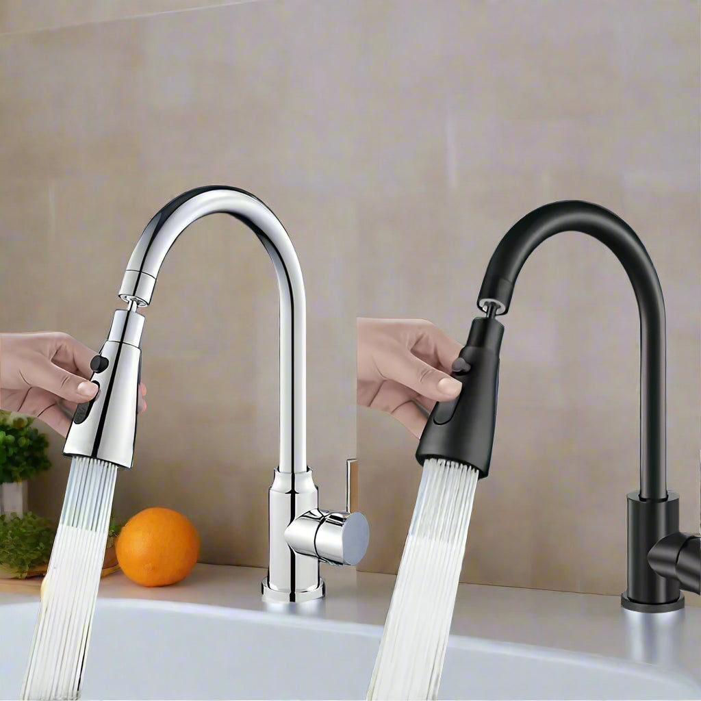 Two kitchen faucets, one silver and one black, with water flowing from them over a sink.