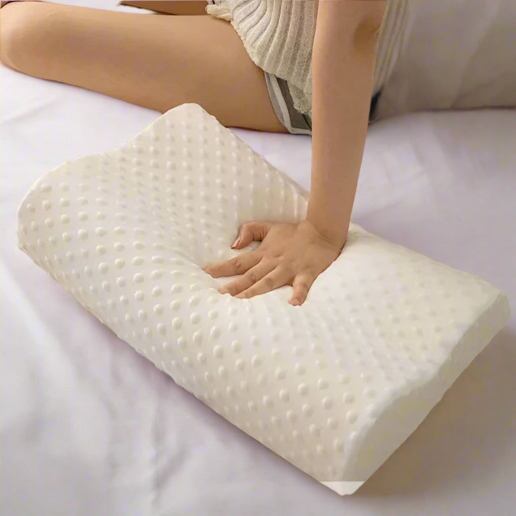 Person holding a white pillow with text 'Slow rebound without collapse' on a light background