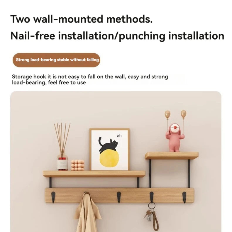 Wall-mounted shelf with hooks and decorative items on a beige wall.