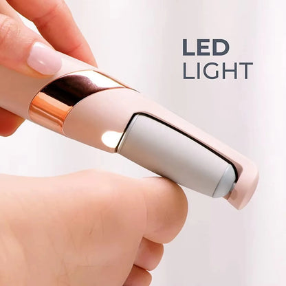 Hand holding a small LED light device with 'LED LIGHT' text on a white background