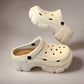 A pair of beige women's platform garden clogs with a 7cm heel, featuring a slip-on design with front and rear straps, and ventilated hole construction.