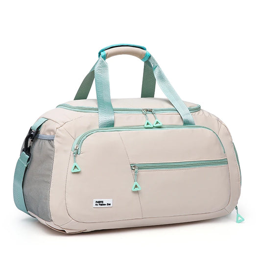 Beige and teal duffel bag on a white background