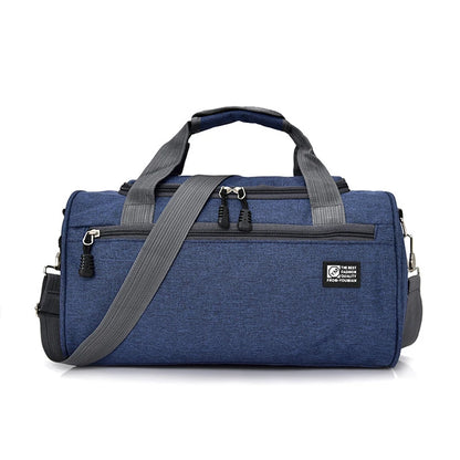 Blue duffel bag with gray straps on a white background