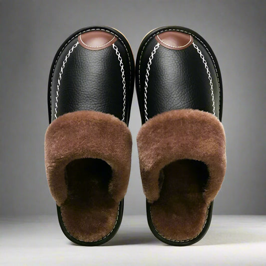 Pair of black slippers with brown fur lining on a white background, branded 'FONGIMIC'.