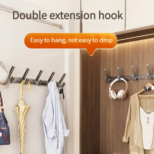 Double extension hook with clothes hanging on it, showing its design and functionality.