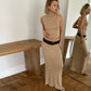 Elegant Knitted Two-Piece Set – Sleeveless Turtleneck Vest & High Waist Skirt