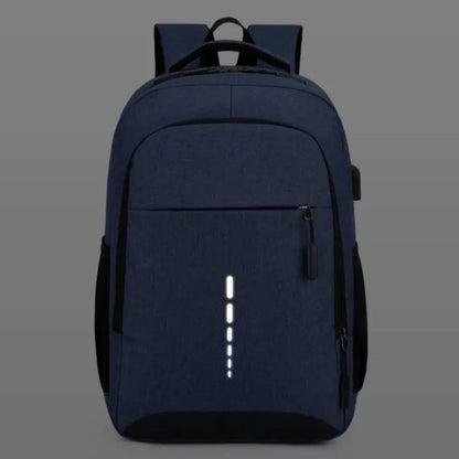 Navy blue backpack with safety reflective strip on a gray background