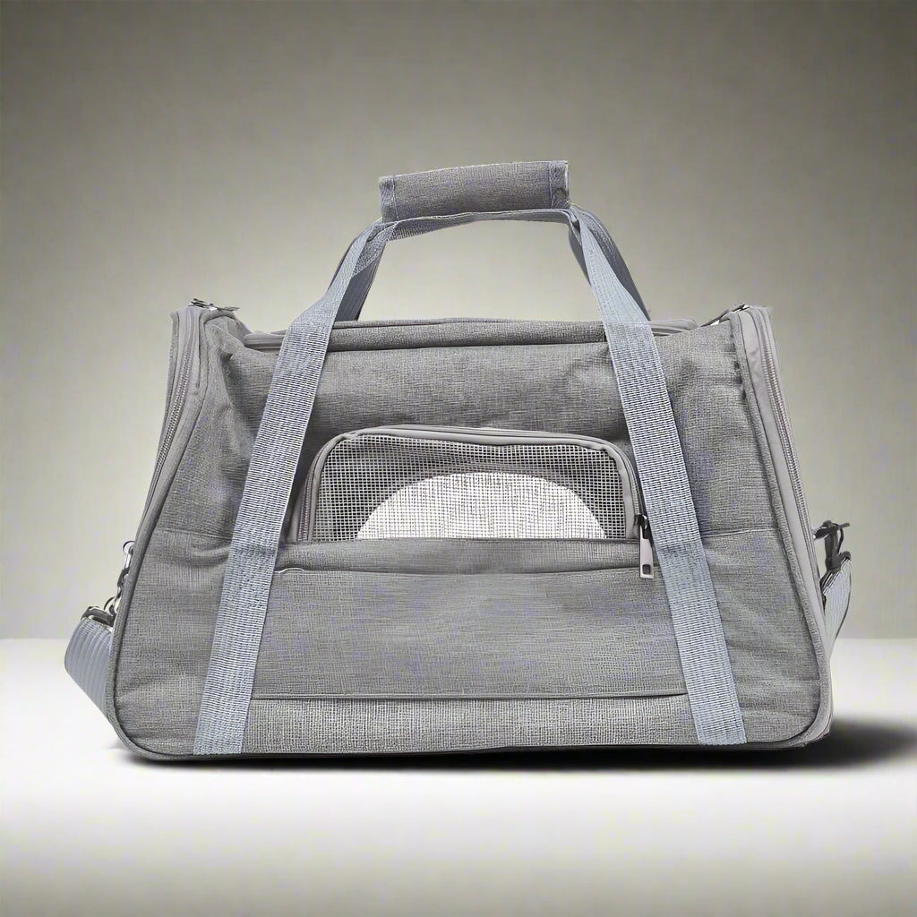Gray pet carrier with mesh front on a white background