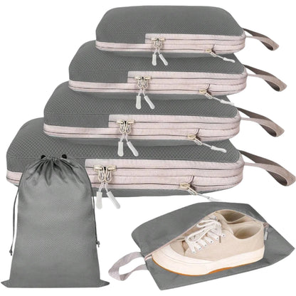 A set of four beige travel packing cubes of various sizes with zipper closure, alongside a portable handbag. The cubes are shown in different configurations to demonstrate their expandable and compressible features.
