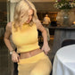 Elegant Knitted Two-Piece Set – Sleeveless Turtleneck Vest & High Waist Skirt