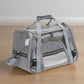 Gray pet carrier with mesh sides on a white background