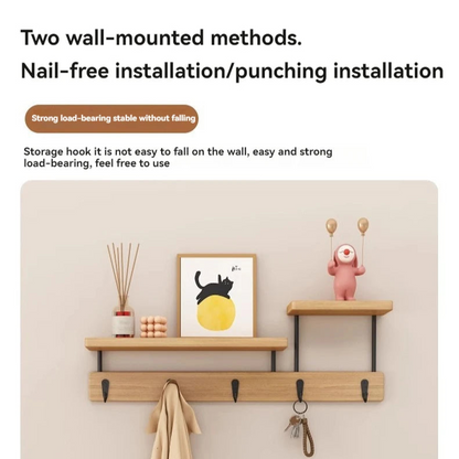 Wall-mounted shelf with hooks and decorative items on a beige wall.